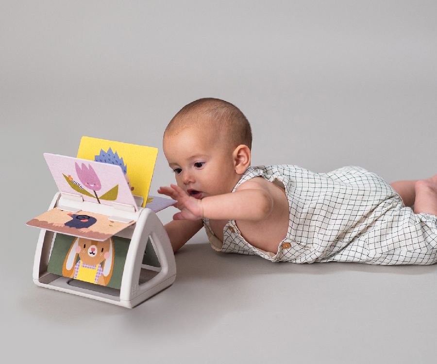 Speelgoed voor het park Taf Toys Tummy-Time Spinning Book, liggend in het park, Tummy Time | Urban Garden